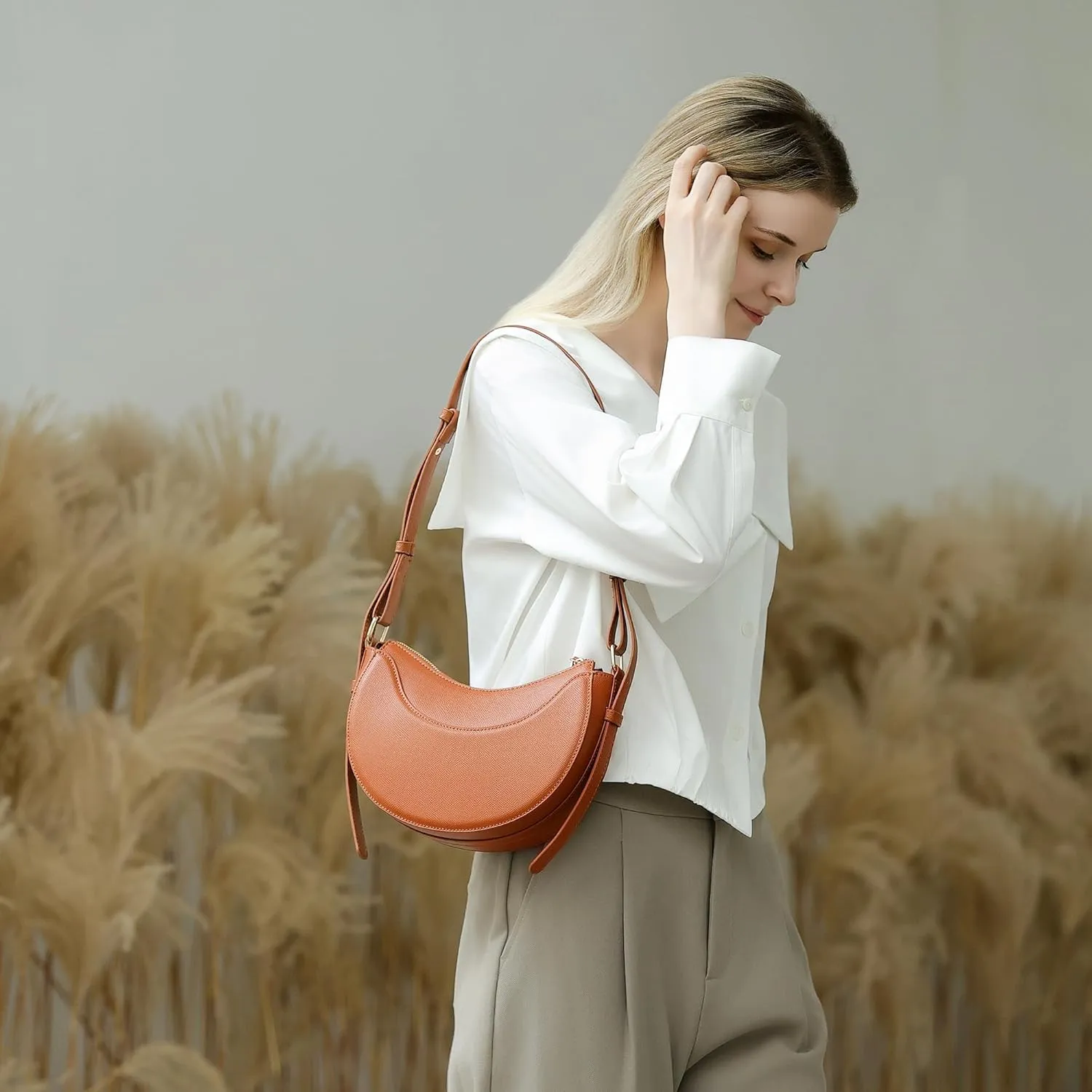 Herald Small Leather Crossbody Bag for Women, Designer Crescent Shoulder Purse Handbag with Adjustable Strap & Tassel